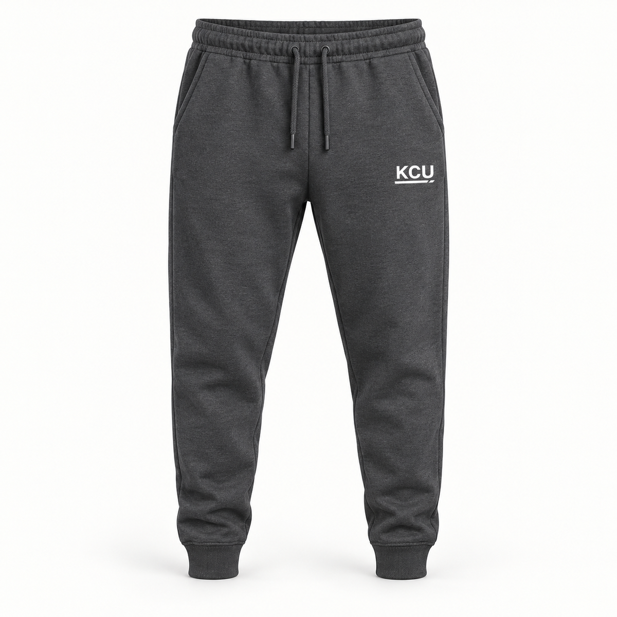 Charcoal men's joggers with a white KCU monogram on the left upper thigh and cuffed ankles.